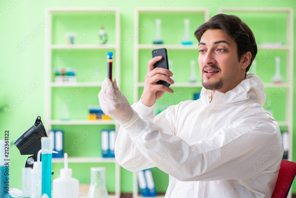 Chemist working in the lab on new experiment Chemist working in the lab on new experiment