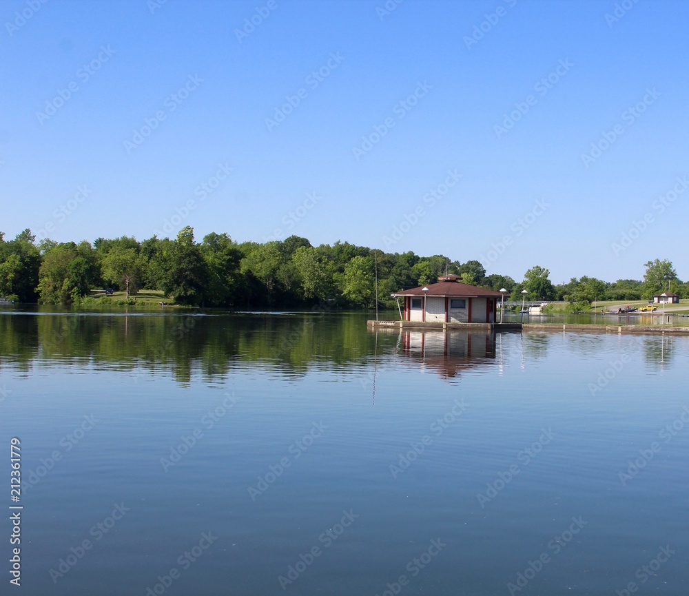 A perfect sunny summertime day at the lake in the park. A perfect sunny summertime day at the lake in the park.