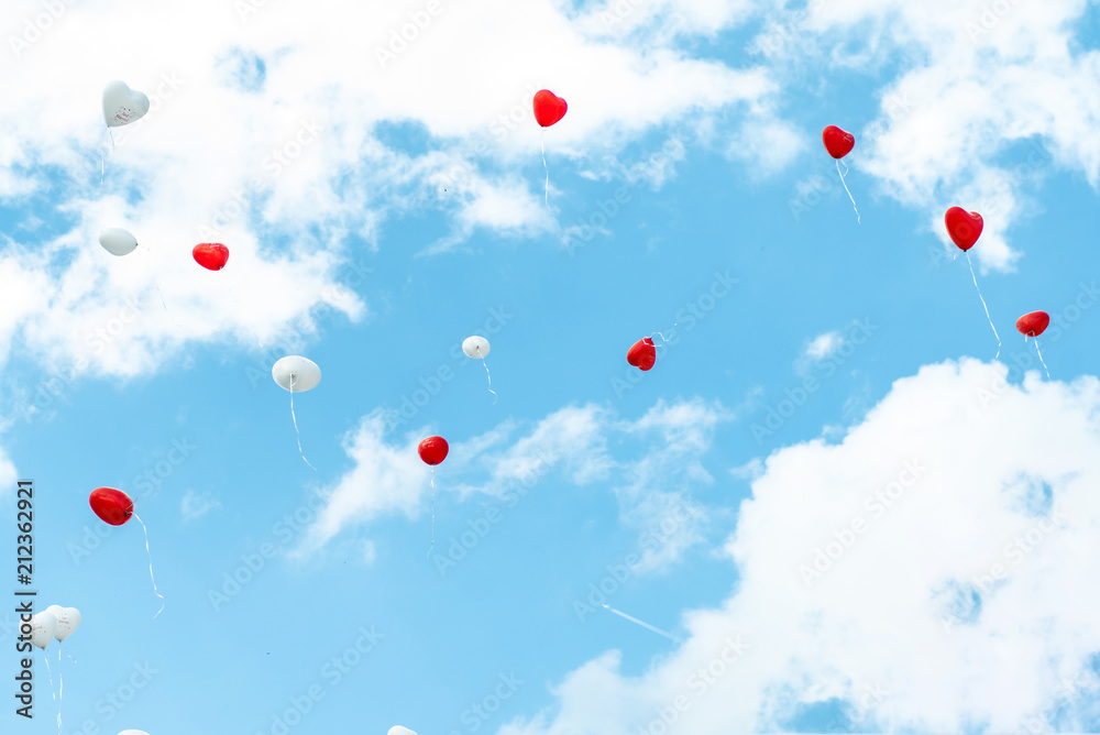 heart balloon with colorful white and red on blue sky concept love in summer and valentine, wedding honeymoon