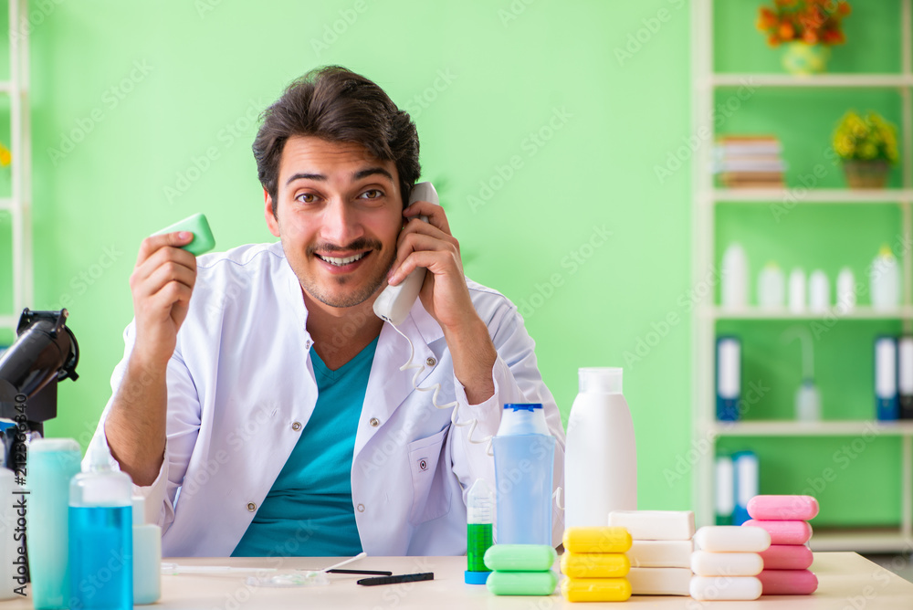 Chemist testing soap in the lab Chemist testing soap in the lab