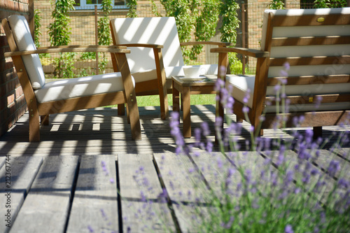 Provence style tea time in the modern backyard garden terrace surrounded by lavender