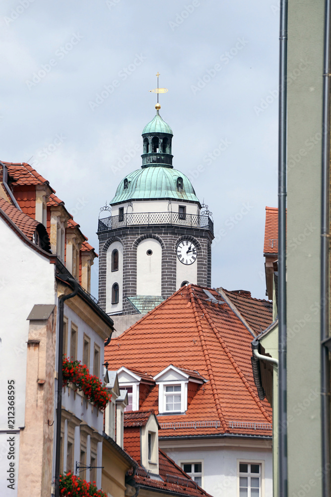 View of elegant streets of Meissen with a beautiful Church of our Lady and tiled roofs, Saxony, Germany, vertical image