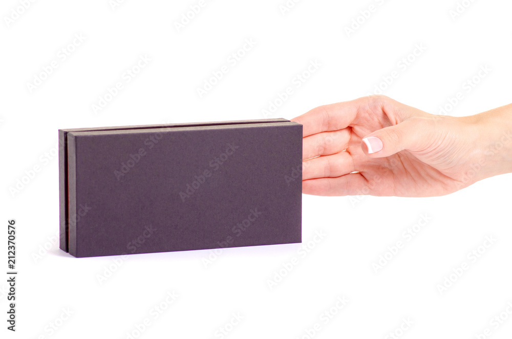 Black box in hand on white background isolation Black box in hand on white background isolation