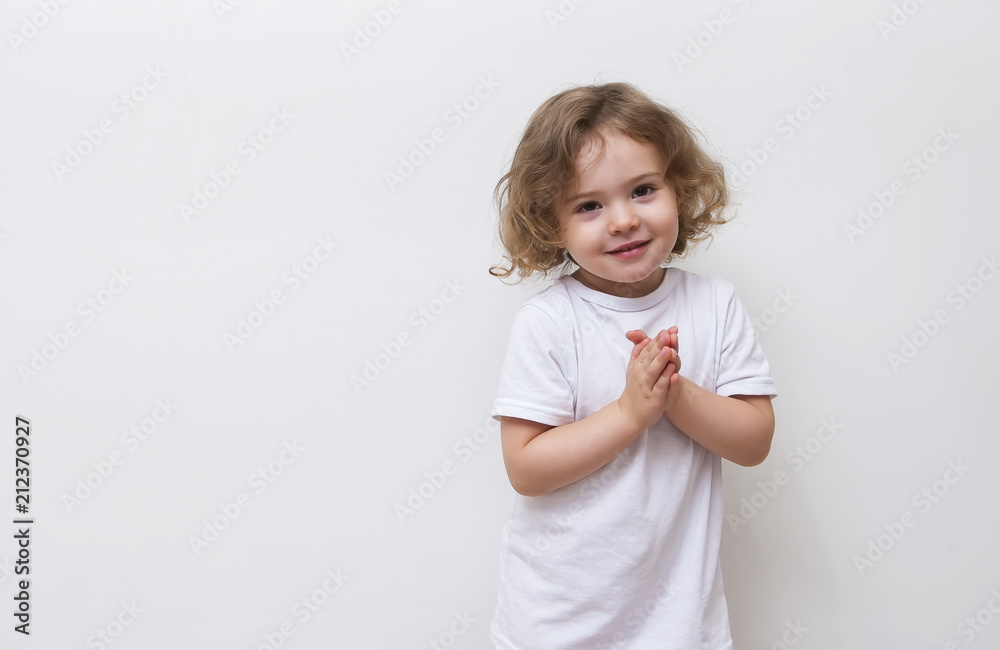 Smiling little girl in white shirt Smiling little girl in white shirt