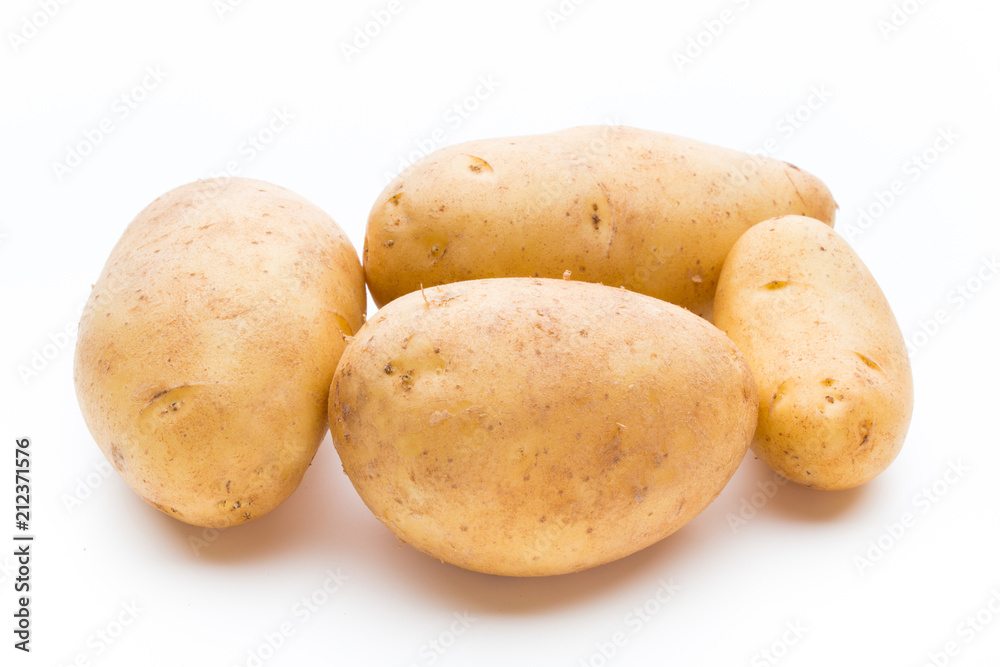 New potato isolated on the white background. New potato isolated on the white background.