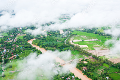 Aerial view of rural Thailand flooded in rain season. © Tanes
