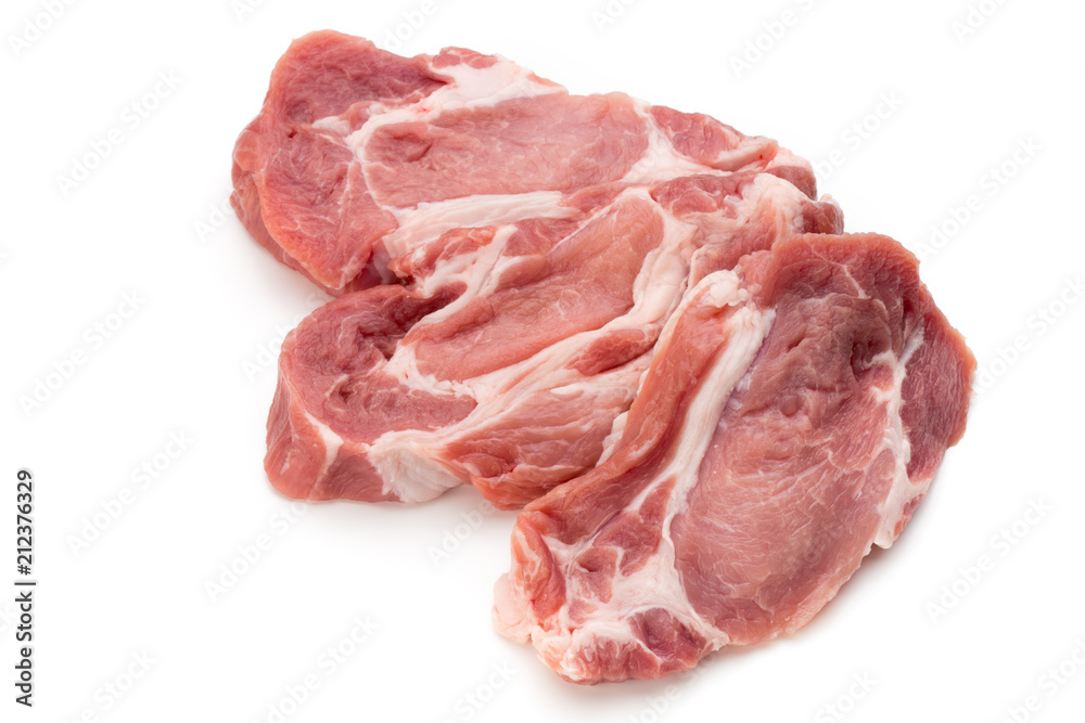 Meat pork slices isolated on the white background. Meat pork slices isolated on the white background.