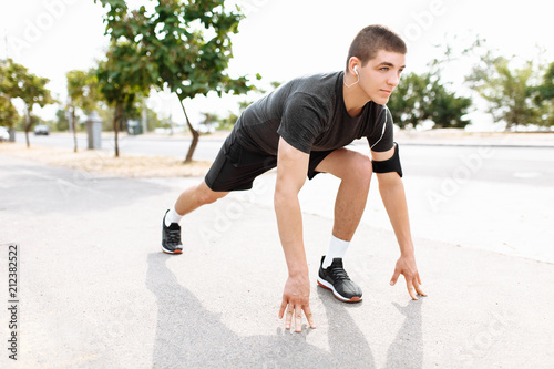 A young man makes a morning jog in the streets, sports training