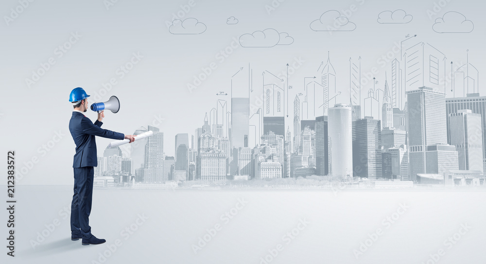Young supervisor architect standing and replanning a big city panorama
Young supervisor architect standing and replanning a big city panorama