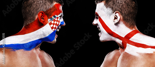 Soccer or football fan athlete with bodyart on face - flags of Croatia vs England. Sport Concept with copyspace.