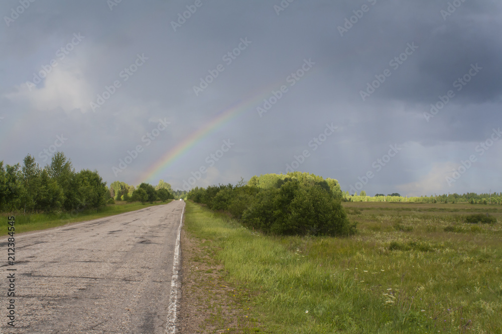 rainbow over the rural road