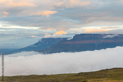 Morning view of Canaima National Park with Kukenan and Roraima tepuys, as seen from the top of the Wei tepui. Venezuela