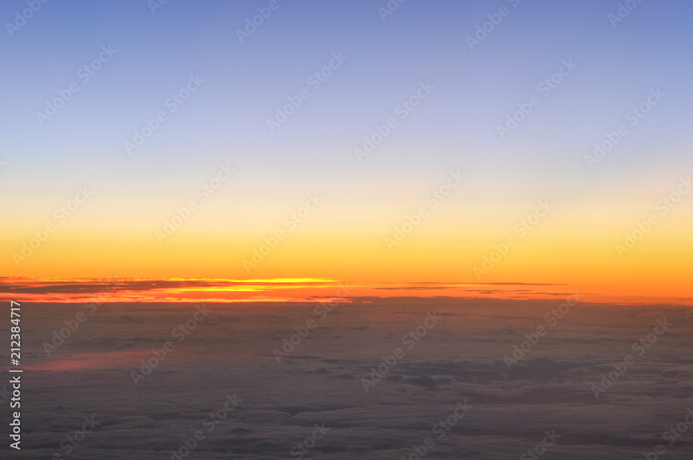 View of the Atlantic Ocean from an airplane, at sunset, on a trip from Europe to North America