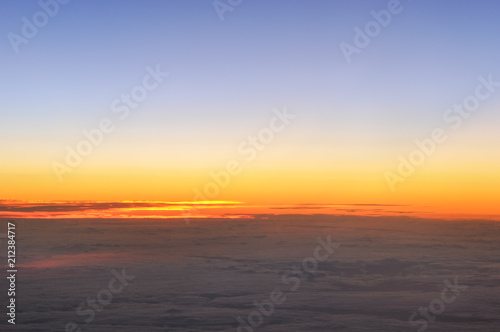 View of the Atlantic Ocean from an airplane, at sunset, on a trip from Europe to North America