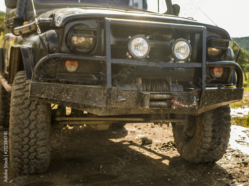 close up dirty bumper off road 4x4 truck car on the dirty ground