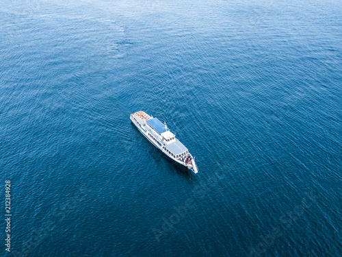 aerial ferry cruise ship top down above view isolated on water sea surface © Mihail