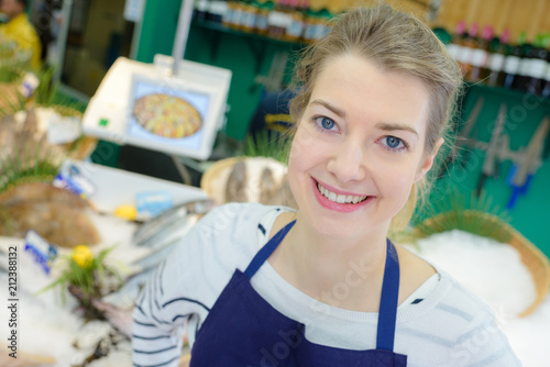 Portrait of female fishmonger photo