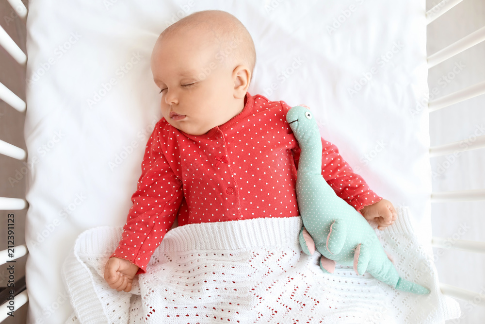 Cute baby girl sleeping in crib, top view Stock Photo Adobe Stock