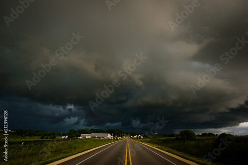 Storm moving in over the highway in Iowa on a summer afternoon