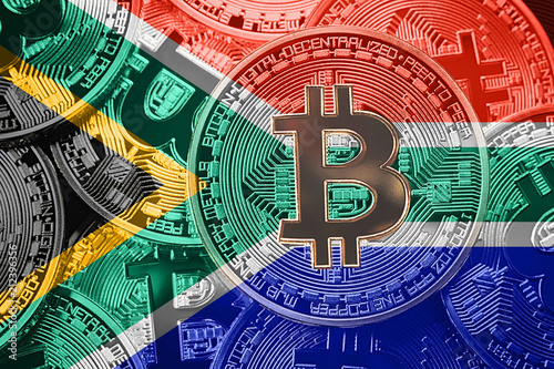Stack of Bitcoin Sauth Africa flag. Bitcoin cryptocurrencies concept. BTC background. photo