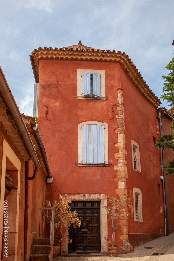 Pretty red building in Roussillon, Provence, France.