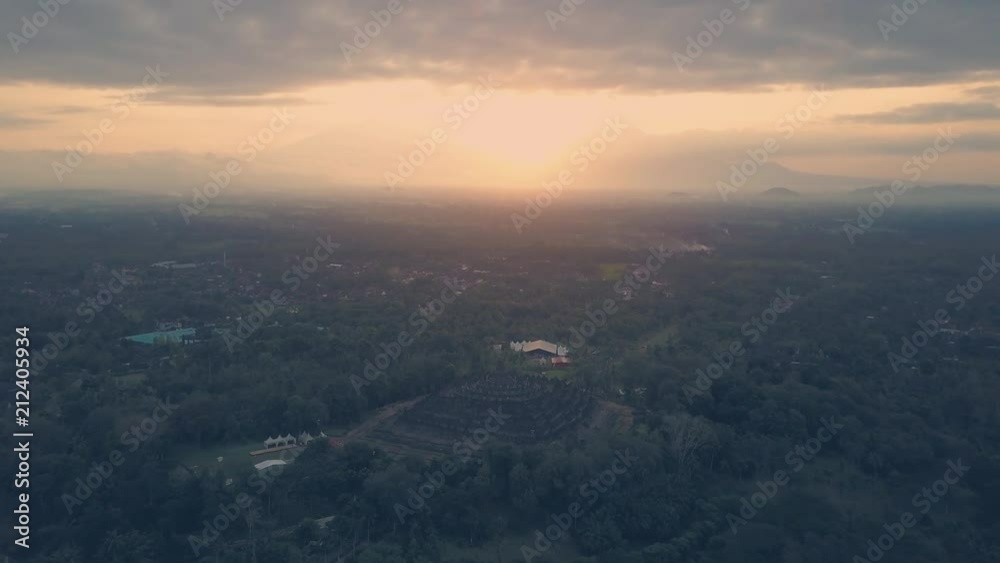 Borobudur temple aerial view at sunrise a UNESCO site and World largest Buddhist temple, Indonesia Borobudur temple aerial view at sunrise a UNESCO site and World largest Buddhist temple, Indonesia