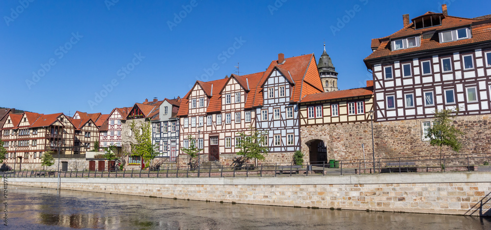 Panorama of colorful houses at the Fulda riverside in historic Hannoversch Munden, Germany