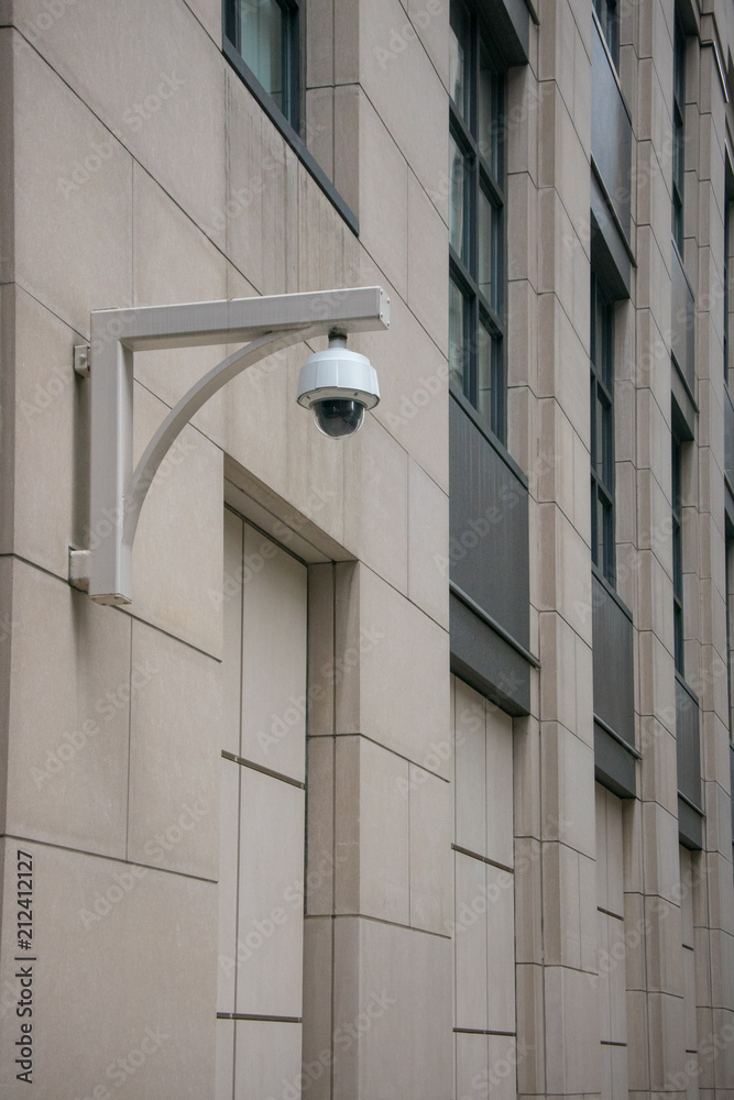Security Camera on an Old Stone City Building Security Camera on an Old Stone City Building