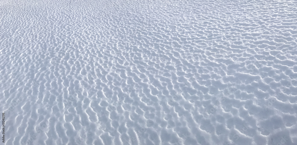 shapes on snow surfaces, wind, wear and storm effects