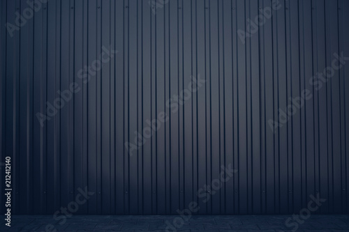 Dark gray or black metal exterior wall in the car parking as background texture