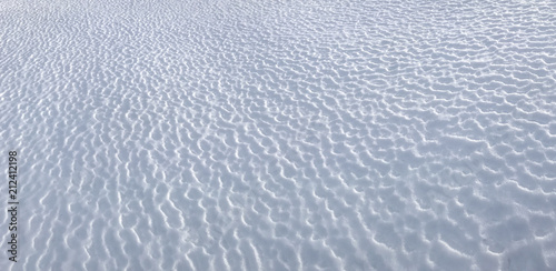shapes on snow surfaces, wind, wear and storm effects