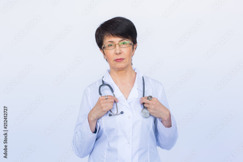 Doctor woman smile face with stethoscope over white background Doctor woman smile face with stethoscope over white background