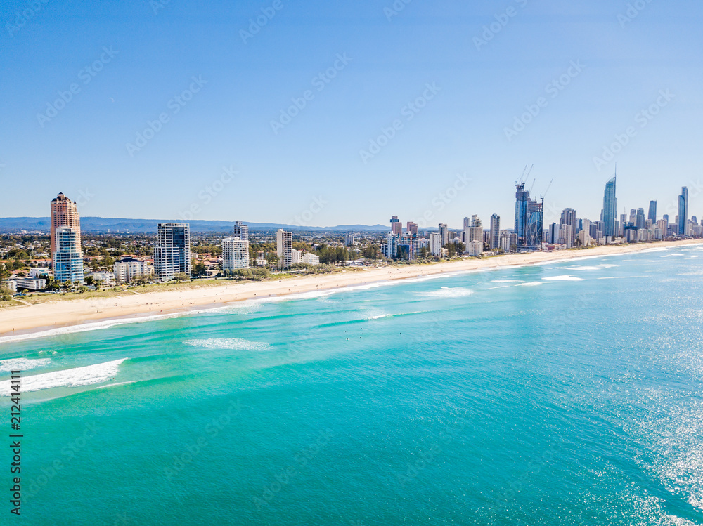 An aerial view for the Broadbeach skyline on the Gold Coast in Queensland with blue water