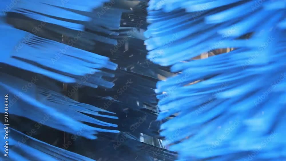 driving through blue spinning car wash