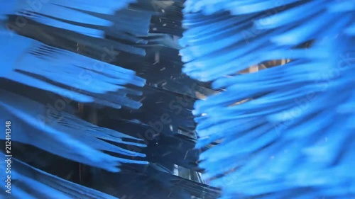 driving through blue spinning car wash