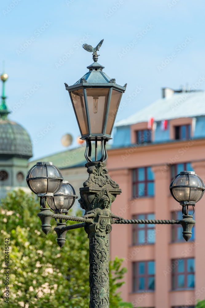 lamppost wrought iron in vintage style on a street in a European city
