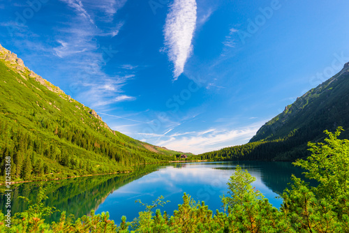 Fototapeta Naklejka Na Ścianę i Meble -  View of the mountain lake Morskie Oko in the Tatra Mountains, in the mountains of Poland
