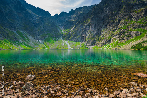 Fototapeta Naklejka Na Ścianę i Meble -  a cold picturesque mountain lake  Czarny Staw in the high Tatra mountains in Poland