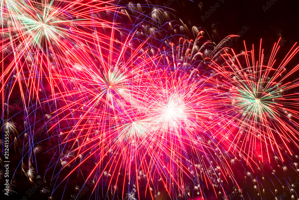 red pink bright salute in the night dark sky, beautiful splashes red pink bright salute in the night dark sky, beautiful splashes
