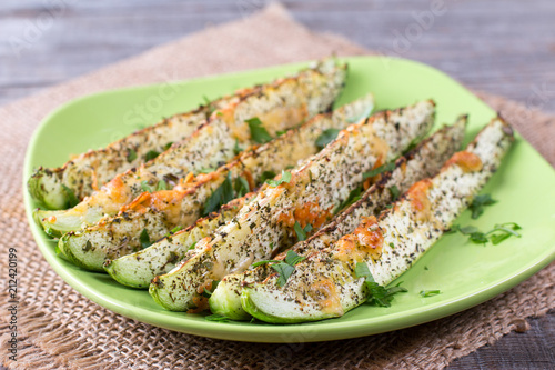 Baked Garlic Parmesan Zucchini sticks, crunchy and crispy on the outside, moist and tender inside. Served with sauces. Quick and Easy Vegetable Side Dishes. Oven-roasted Zucchini.