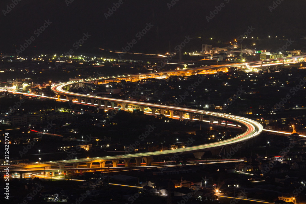 S-curve highway at night in takamatsu city,kagawa,shikoku,japan