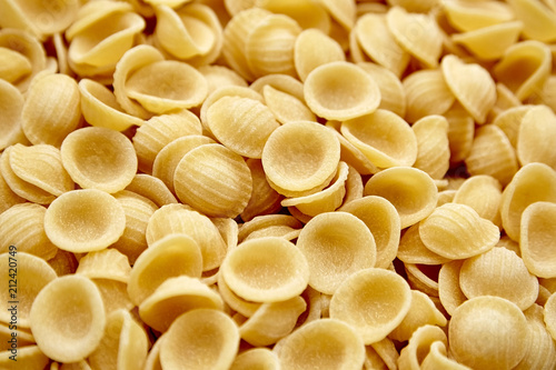 Dry Uncooked Orecchiette Italian Pasta . Food Background