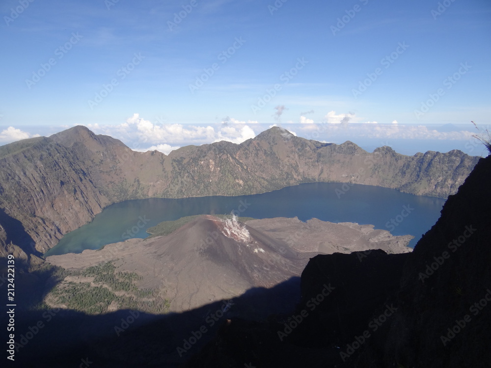 Volcano Lake with active Volcano at Mount Rinjani Volcano Trekking Indonesia