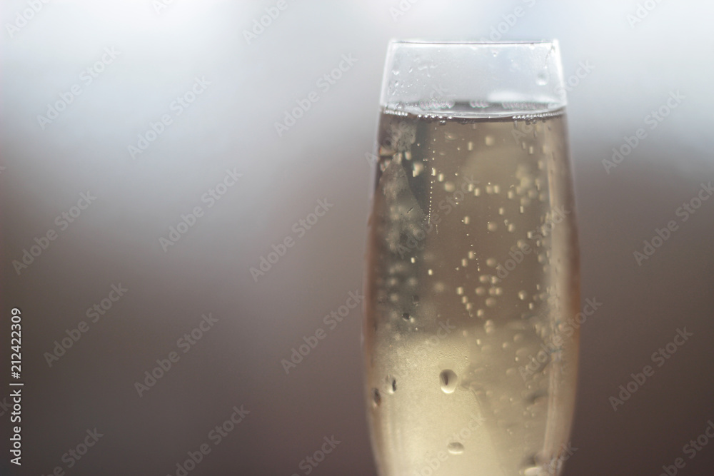 champagne in a glass with bubbles champagne in a glass with bubbles