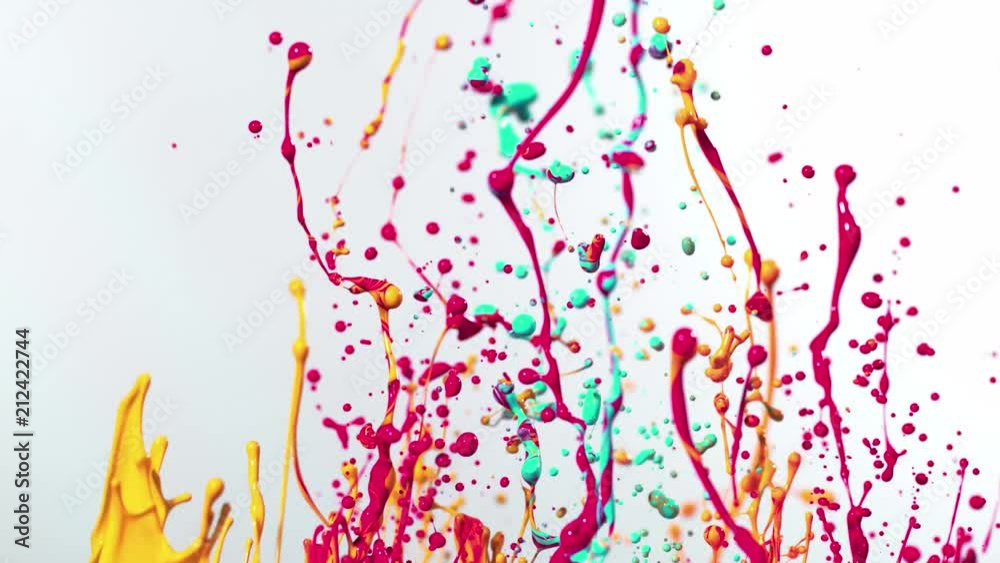 Colorful splashing paint in super slow motion. Shot with high speed cinema camera, 1000fps