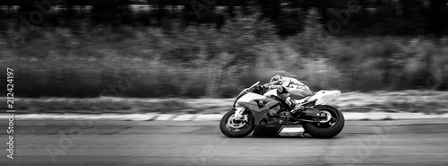 Cuadro en lienzo motorcycle racer on highway and ring races. black and white