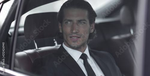 closeup.successful businessman sitting in the car © ASDF