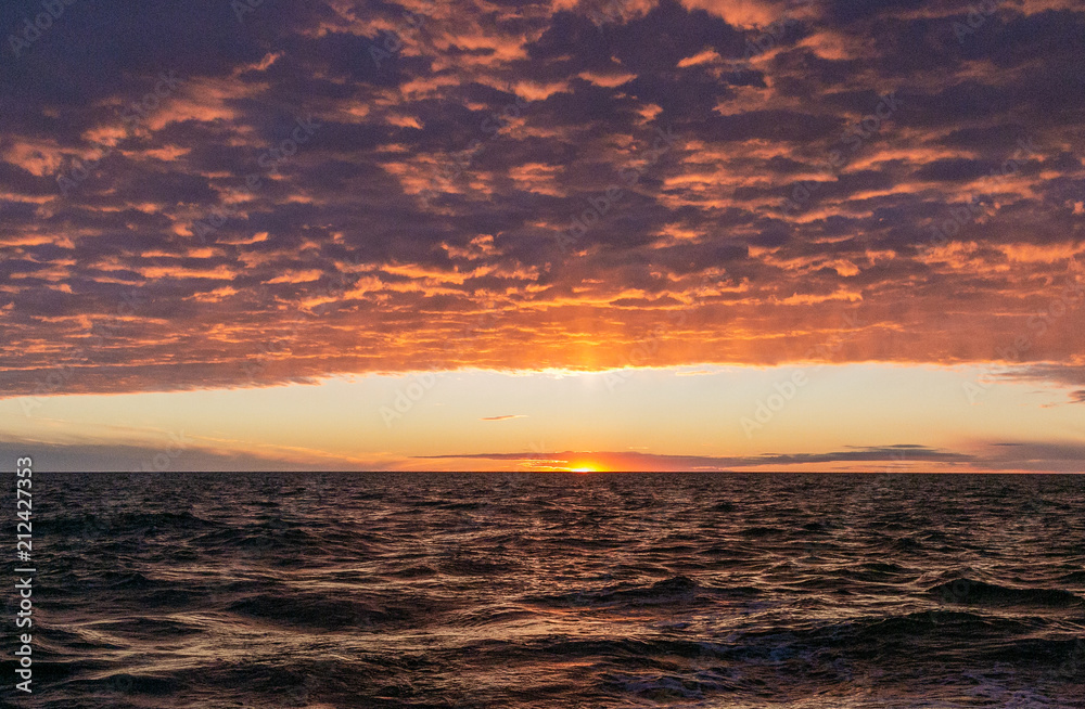 Dramatic sunrise in the ocean