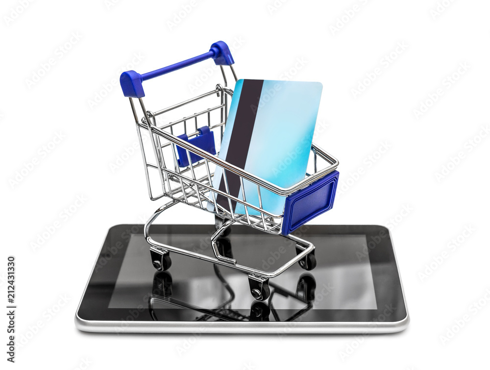 Shopping cart with credit card on tablet PC. Isolated on white. Online shopping concept. Shopping cart with credit card on tablet PC. Isolated on white. Online shopping concept.
