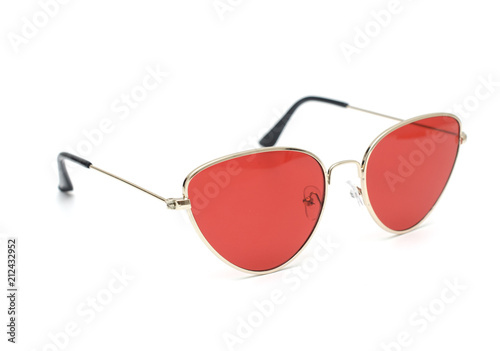 sunglasses cat's eye with red glass in metal frame isolated on white